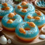 Colorful aquarium jelly donuts arranged on a plate