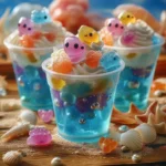 Vibrant COTTON CANDY Aquarium Parfait dessert showcasing fluffy candy and colorful layers.