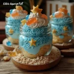 Delicious edible aquarium fluff dessert in a glass decoration