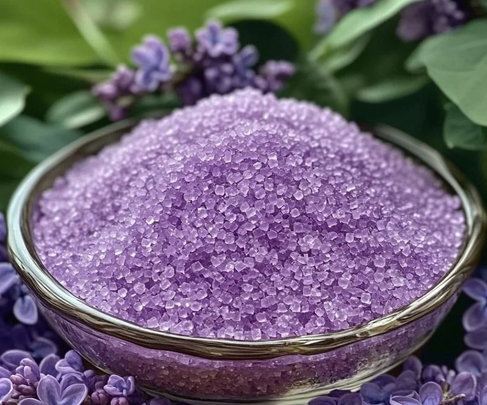 A jar of Lilac Sugar surrounded by lilac flowers, showcasing its unique flavor.