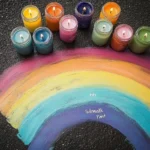 Colorful puffy sidewalk paint on a concrete surface creating fun outdoor art.