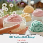 Colorful DIY bubble bath dough in a bowl with bubble bath ingredients.