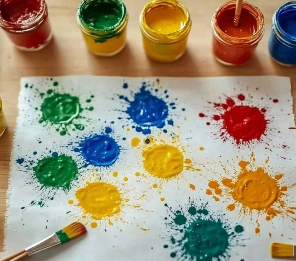 Colorful fizzy painting with baking soda, showcasing bubbles and vibrant colors.
