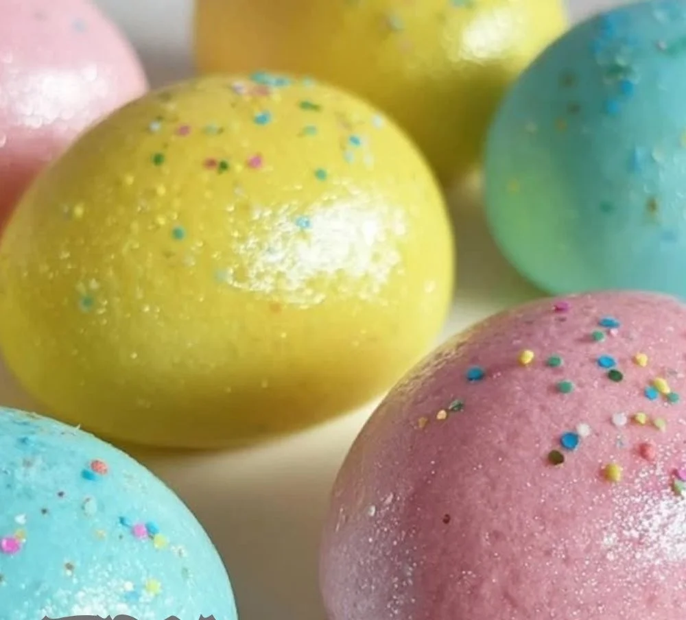 Homemade bubble bath dough in vibrant colors for a fun bath experience.