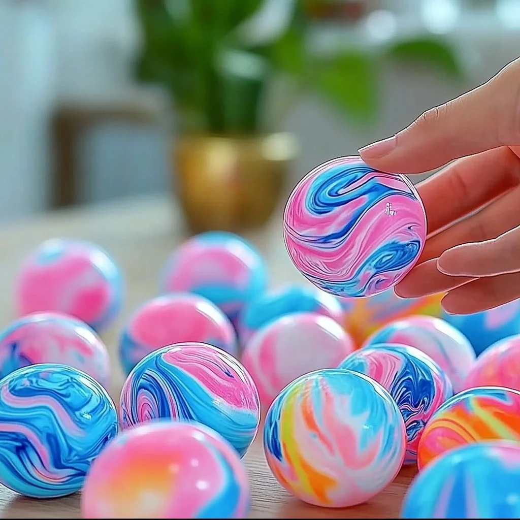 Colorful tie-dye bouncy balls for playful and energetic fun