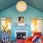 Beautifully designed blue color drenched living room showcasing elegant decor.