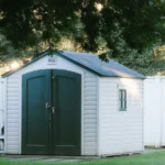 Beautifully decorated garden shed with festive Christmas theme and outdoor decor.