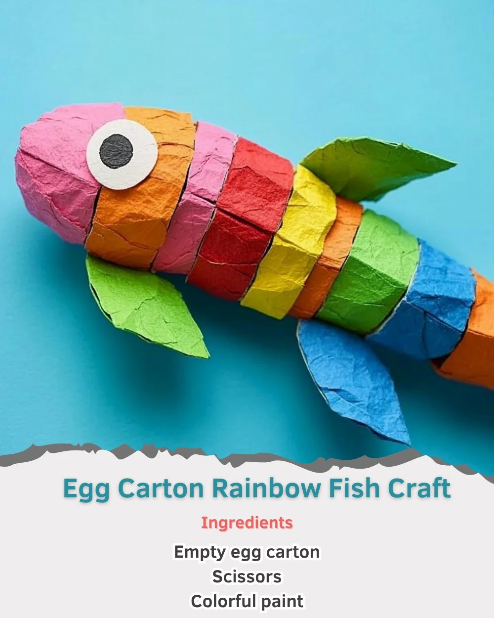 Colorful egg carton rainbow fish craft made by kids using recycled materials.