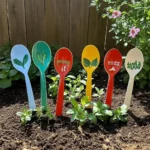 Handcrafted garden spoon markers for plant labeling and garden decoration.