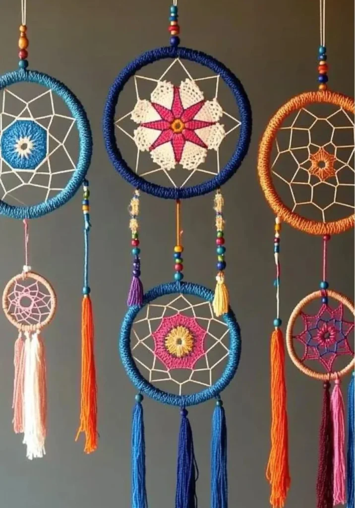 Handmade DIY dreamcatcher with colorful feathers and beads