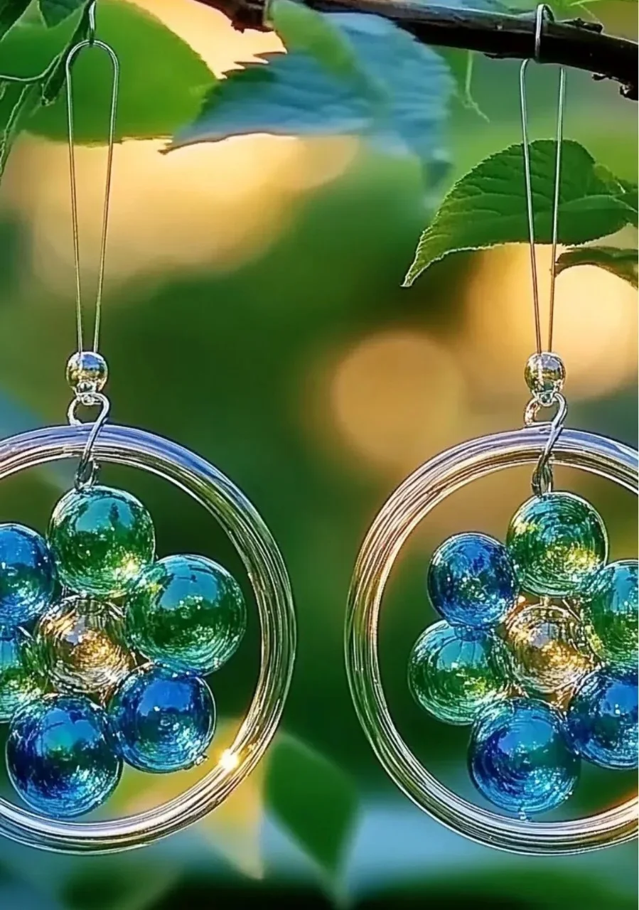 Colorful glass bead suncatcher shining in sunlight