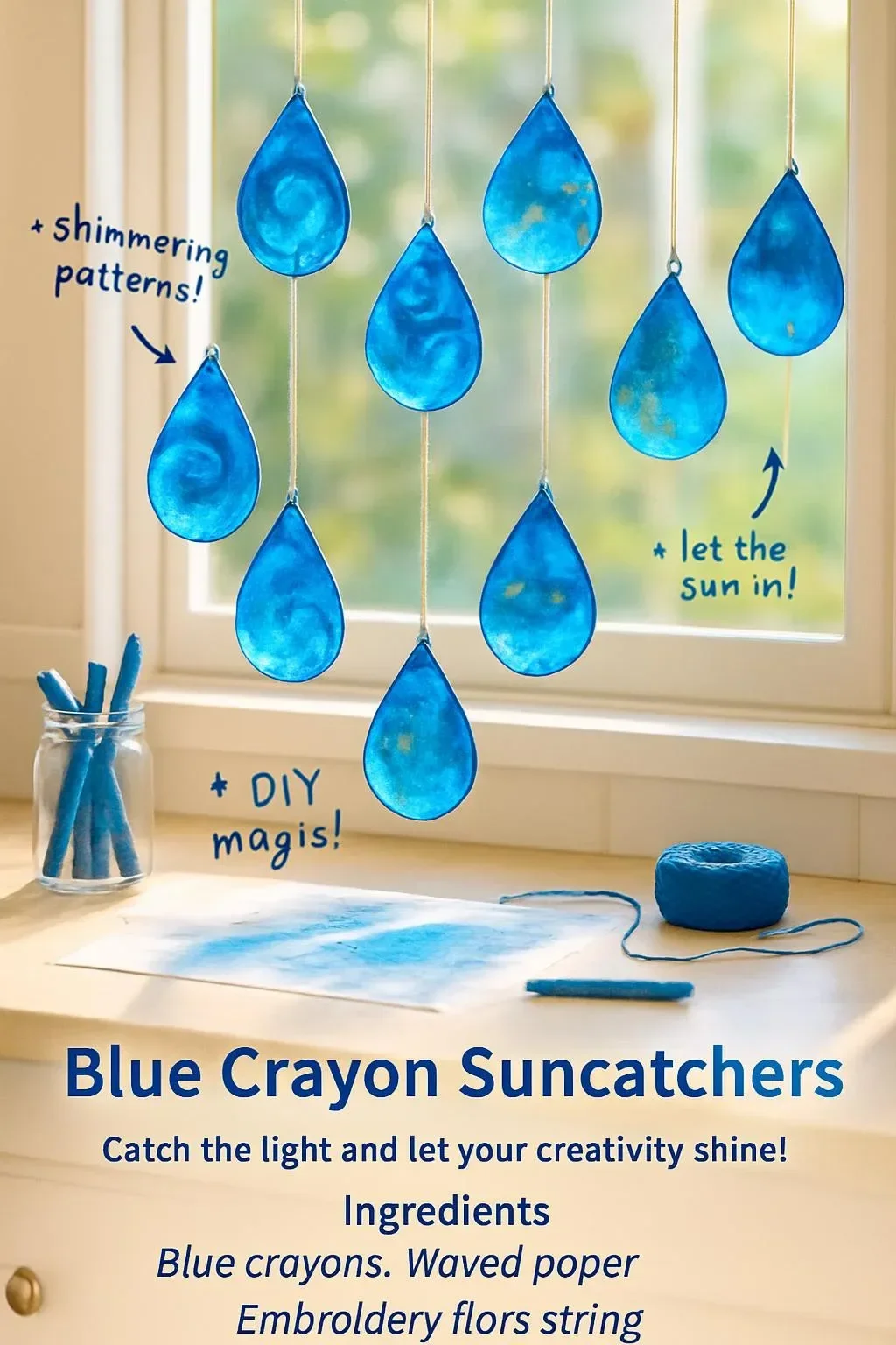 Beautiful blue crayon suncatchers hanging in the window, creating colorful light patterns.