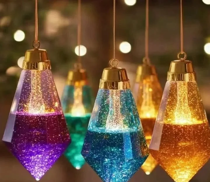 DIY mini lava lamp ornaments showing colorful liquid movement and design.
