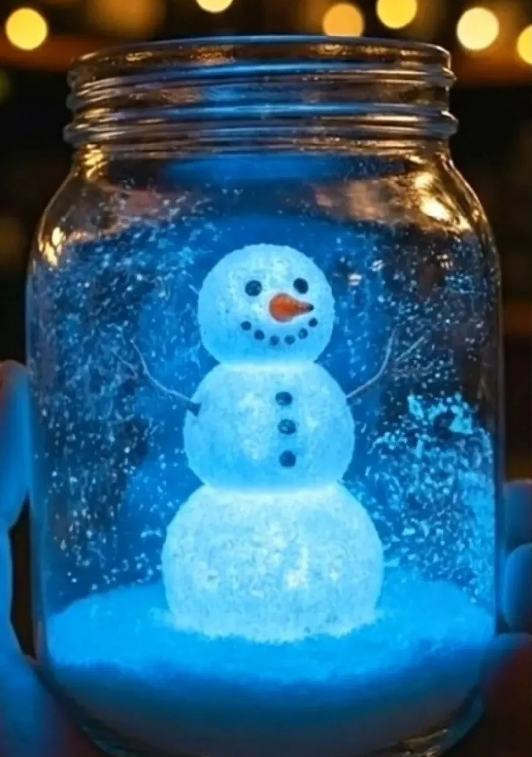 Glowing baking soda snowman craft for holiday decorations