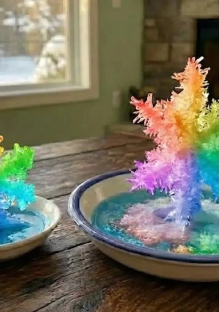 Beautiful rainbow crystal snowflakes reflecting light in a vibrant display.