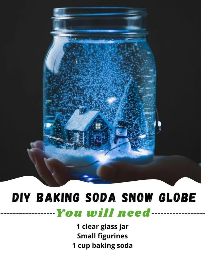 DIY baking soda snow globe craft project with winter scene