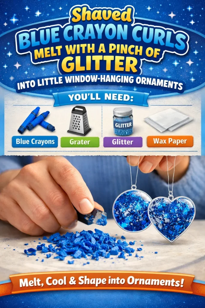 Woman in blue sweater holds window-hanging ornaments made from blue crayon curls and glitter.