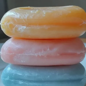 Colorful homemade play dough displayed in various shapes and sizes