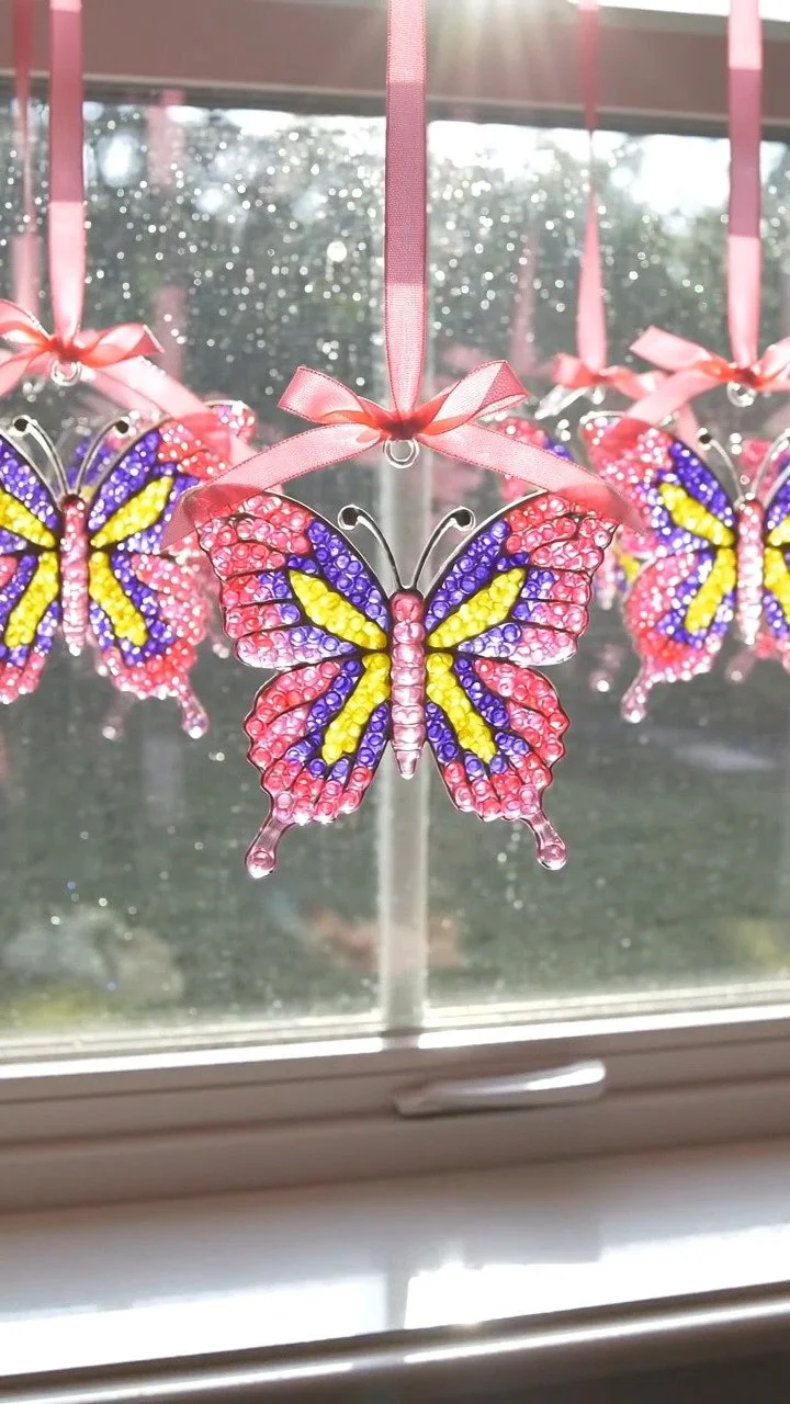Butterfly pony bead suncatchers melt into vibrant glowing butterfly designs ✨ Watch sunlight shine through colorful beads. Save this DIY! #SuncatcherDIY #ButterflyCraft #BeadCraft #KidsArt #CreativeK...