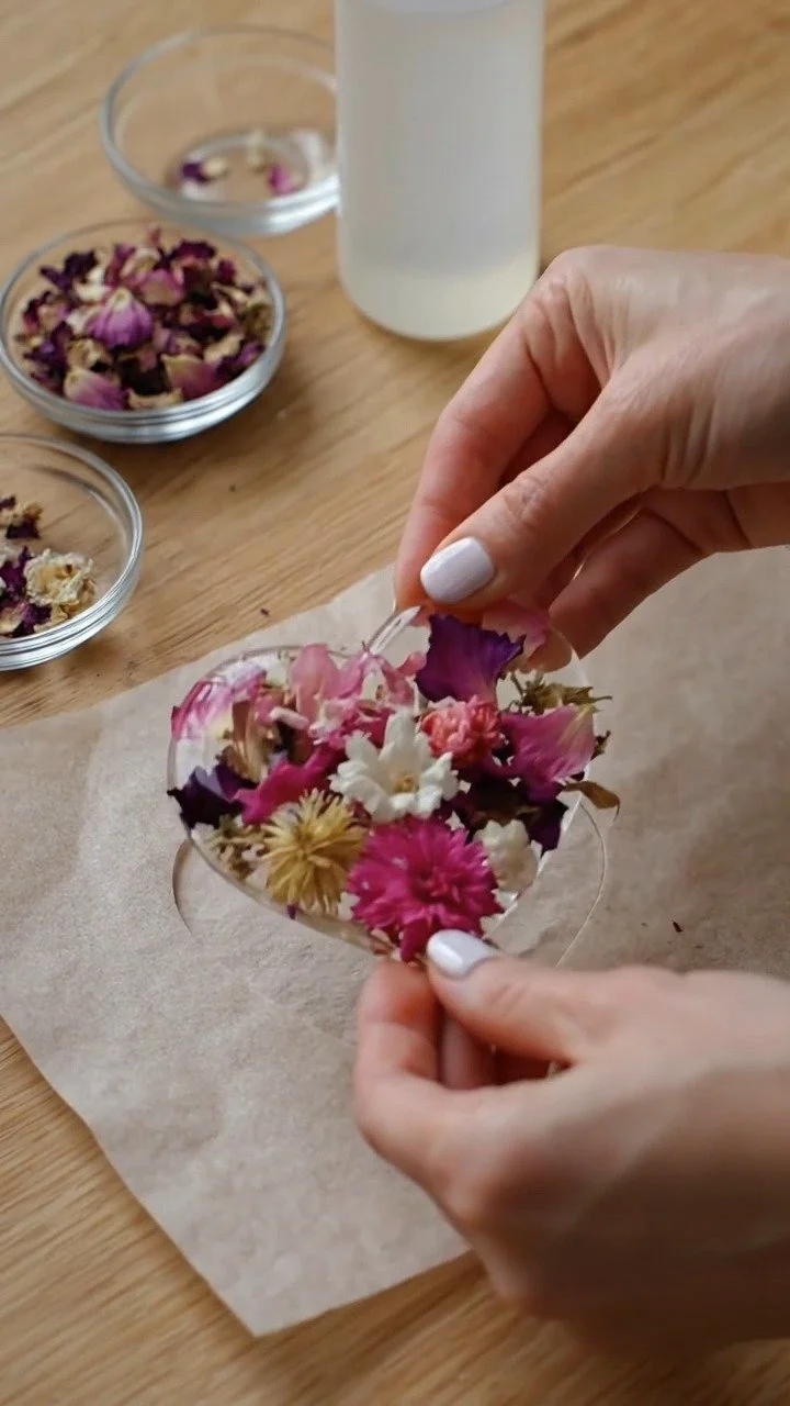 Clear glue flower hearts dry into delicate translucent floral heart keepsakes ✨ A beautiful and easy handmade DIY. Save this project! #GlueCraft #HeartCraft #FloralDIY #KidsArt #CreativeKids #DIYDeco
