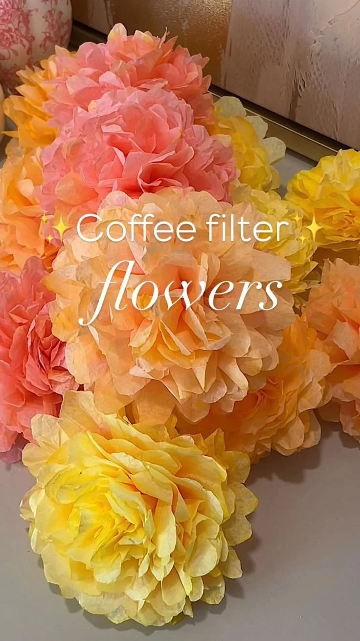 Coffee filter flower wall art | Coffee filter garland, Floral craft ideas, A centerpiece