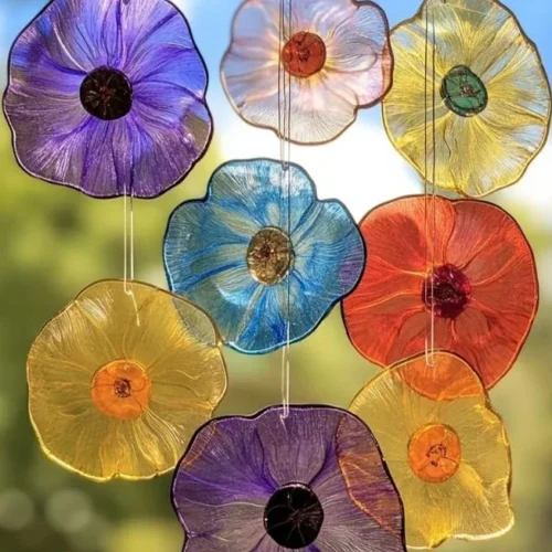 Colorful DIY bioplastic sun catcher hanging in sunlight