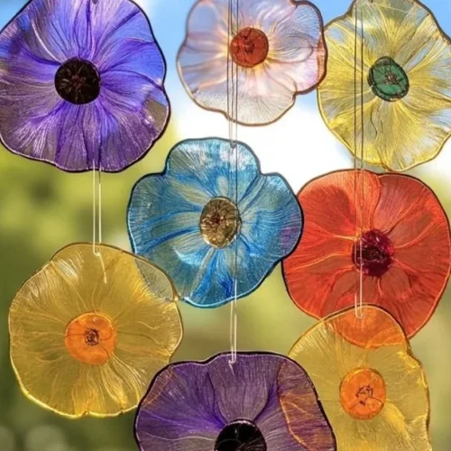 Colorful DIY bioplastic sun catcher shining through sunlight
