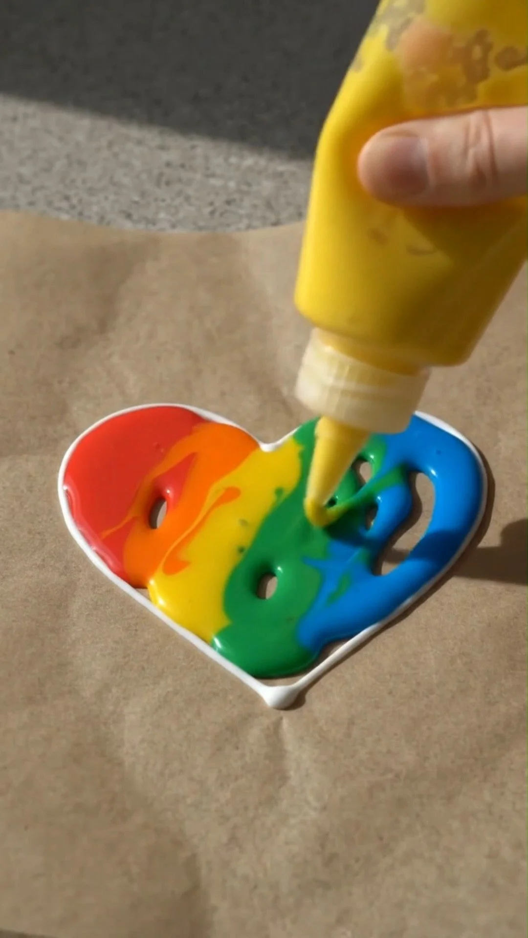 Rainbow glue window suncatcher glows beautifully with vibrant translucent colors in sunlight ✨ A fun and magical DIY. Save this project! #SuncatcherDIY #GlueCraft #RainbowCraft #KidsArt #CreativeKids