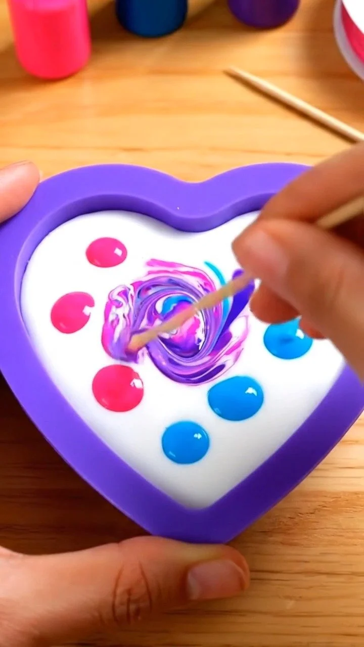 Swirled glue sun catcher ornament sparkles with colorful swirling patterns that glow beautifully in sunlight ✨ A magical decorative DIY. Save this project! #SuncatcherDIY #GlueCraft #KidsArt #Creativ